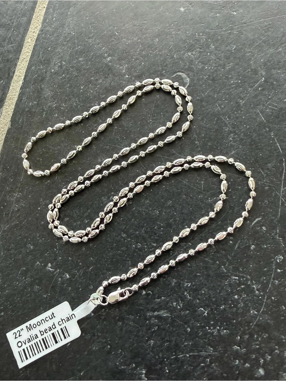 14kt. White Gold faceted mooncut ovalia bead chain 22” long